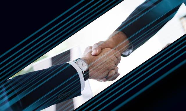 Business partners agreeing on a deal after a trade mission introduction